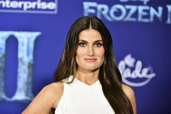 Idina Menzel shares pics of backyard wedding to Aaron Lohr Daily Mail